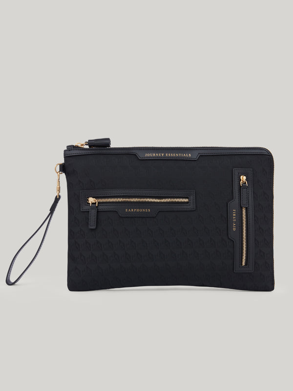 Crafted from hard-wearing nylon, the Anya Hindmarch Journey Essentials pouch is patched with four labelled pockets on the outside to keep your carry-on essentials within easy reach. Peer into its zip-fastening interior, and you’ll find designated space for those bits you need to keep extra safe, too.