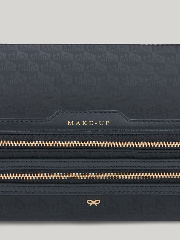 The Anya Hindmarch Makeup pouch is a must-have for both long-haul trips and weekends away. With a streamlined yet cleverly organised design, its dual zipped compartments will keep make-up brushes separate from products like eyeshadows, blusher, lipsticks, and more – ensuring everything stays clean and easy to locate. 