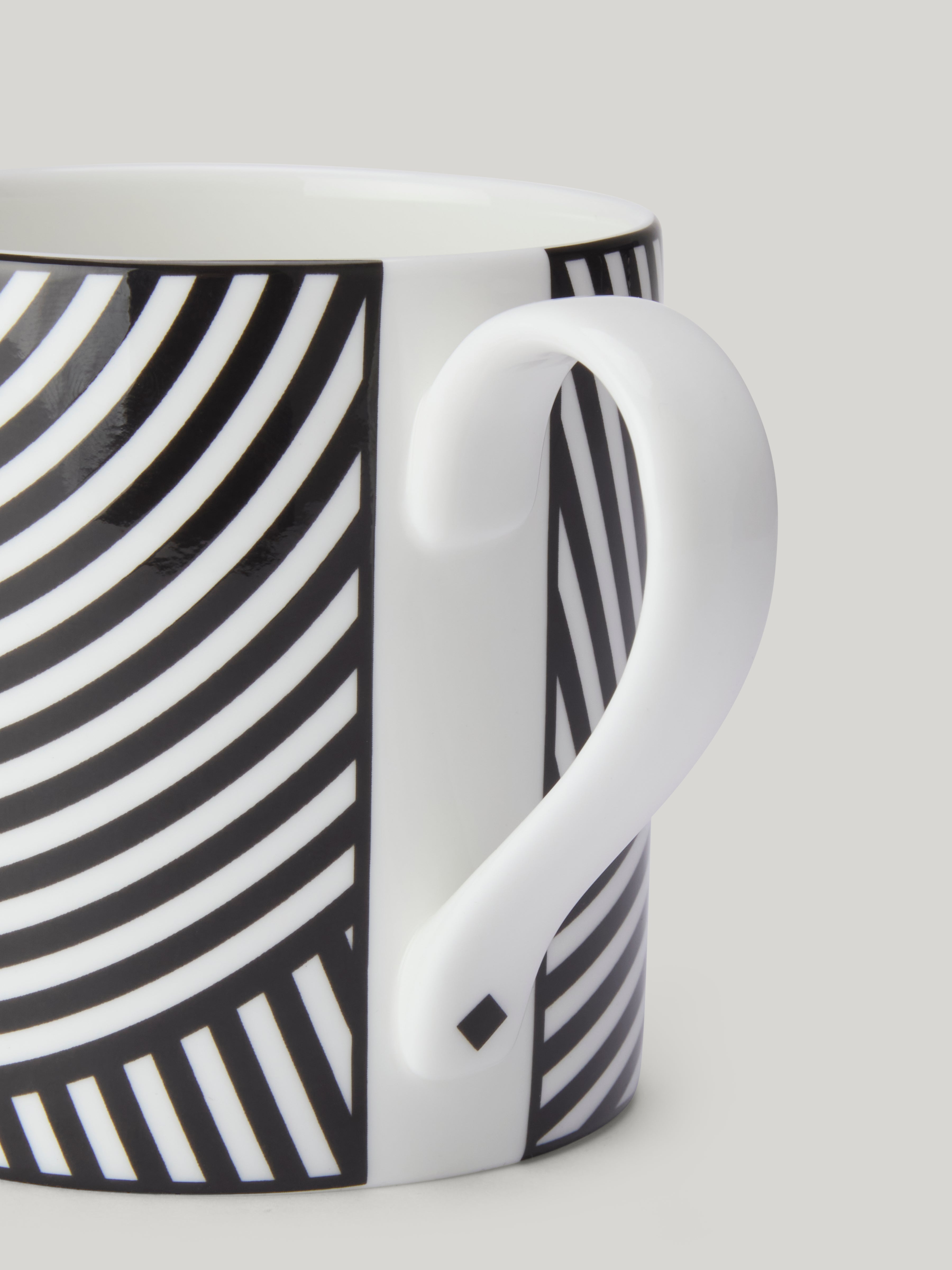 Part of our Claridge's x Richard Brendon exclusive collection. Iconic textile designer and ‘architect of floors’, Marion Dorn’s expertise in pattern visualisation and striking graphics landed her the title as ‘one of the most prominent and successful designers of her time’ during the early 20th century.